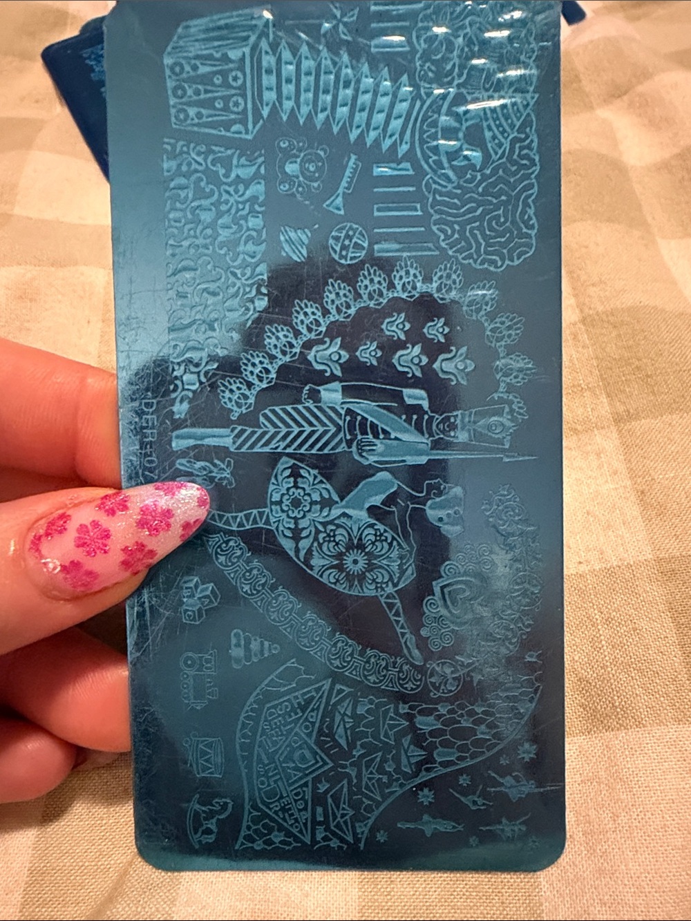 Blue Metal Nail Stamping Plate with Intricate Designs